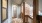 a wooden deck with window and door