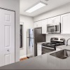 a kitchen with stainless steel appliances
