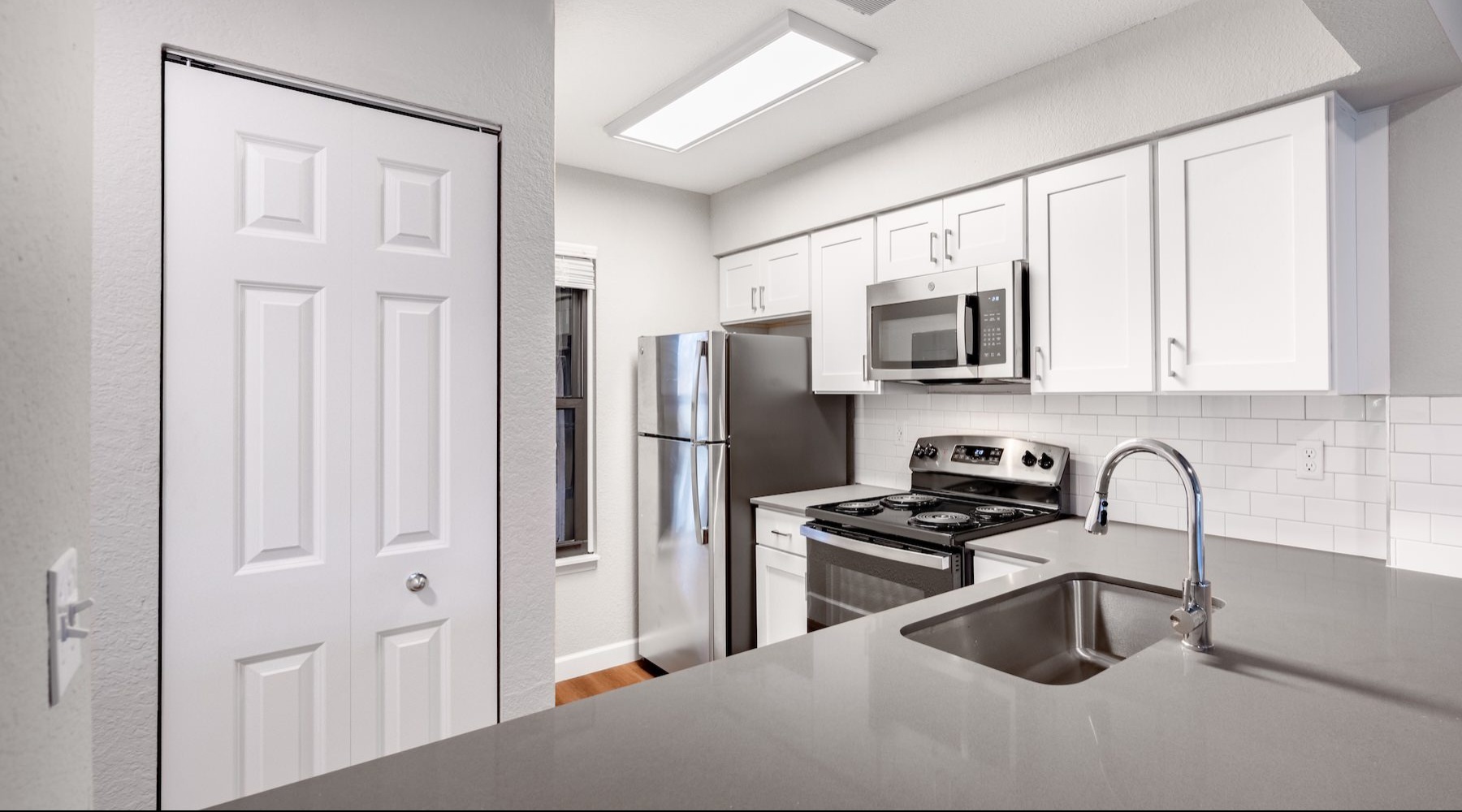 a kitchen with stainless steel appliances