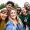 a group of people smiling for a selfie