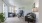 a living room with a tv and couches