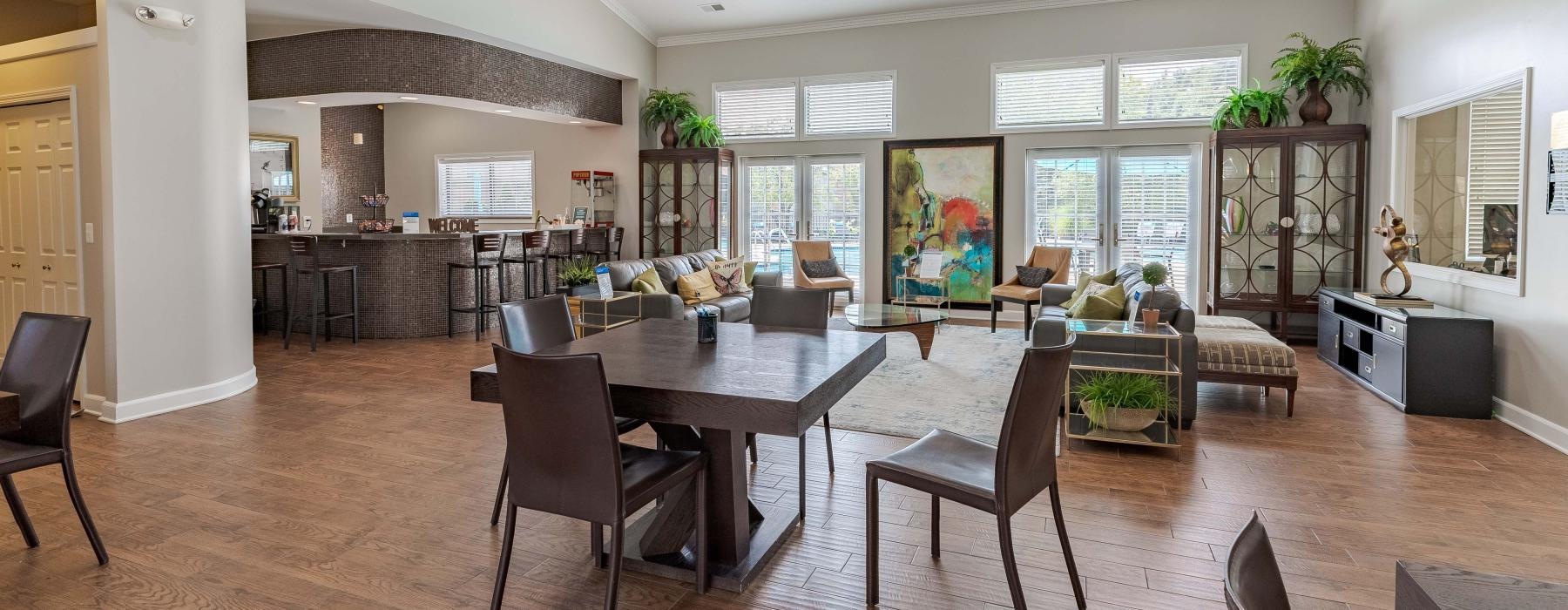 a large room with a table and chairs