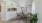 a dining room with a table and chairs