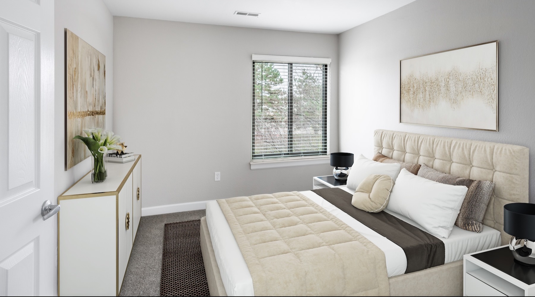 bedroom with a dresser, bed and large nightstand