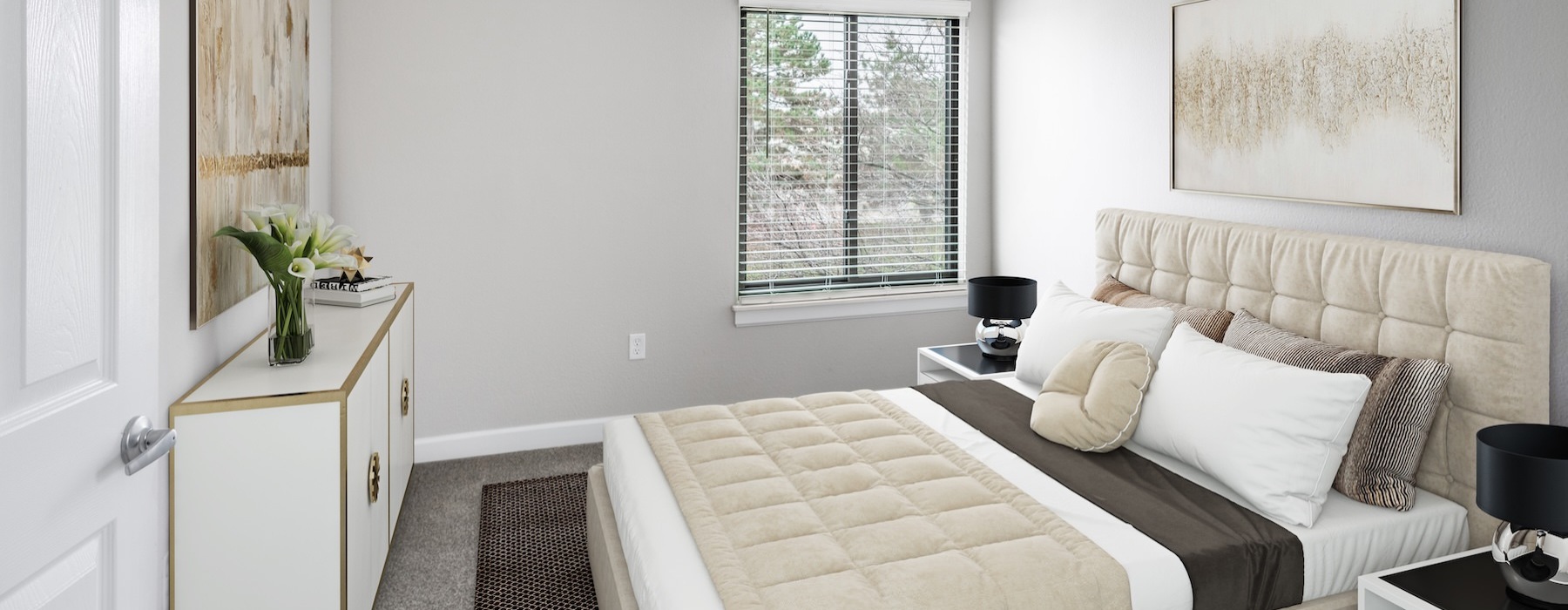 bedroom with a dresser, bed and large nightstand